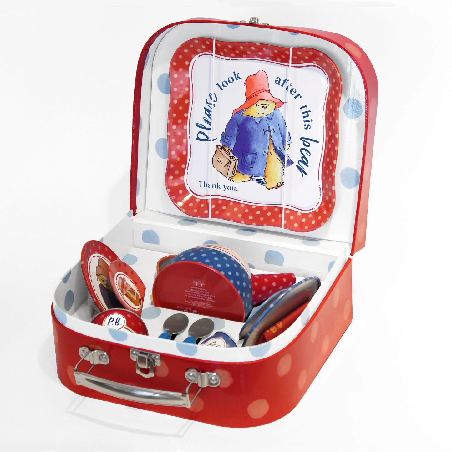 Padding bear suitcase display how it comes packaged with spoons,plates. cups