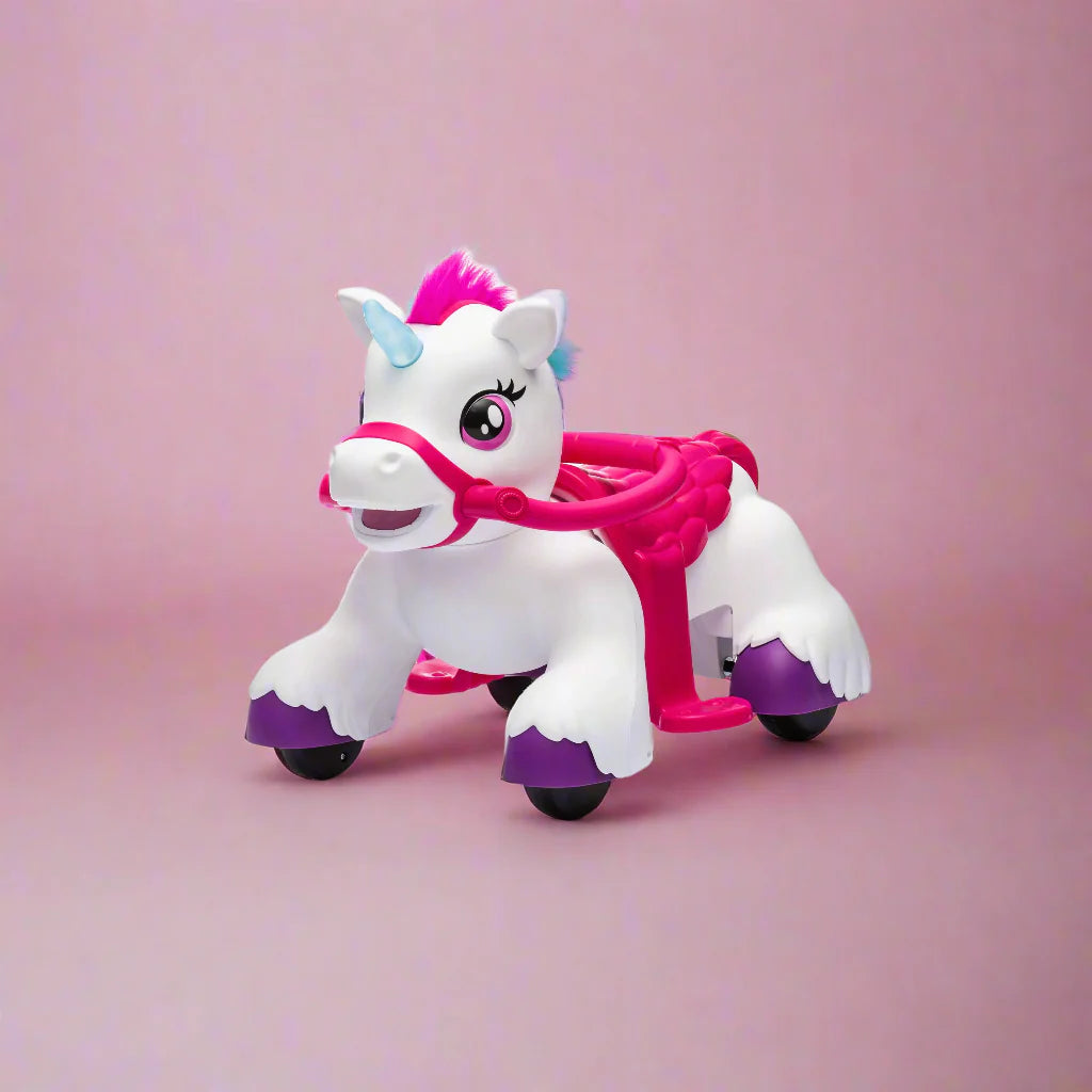 Toy ride on unicorn with pink and purple accents on a pink background