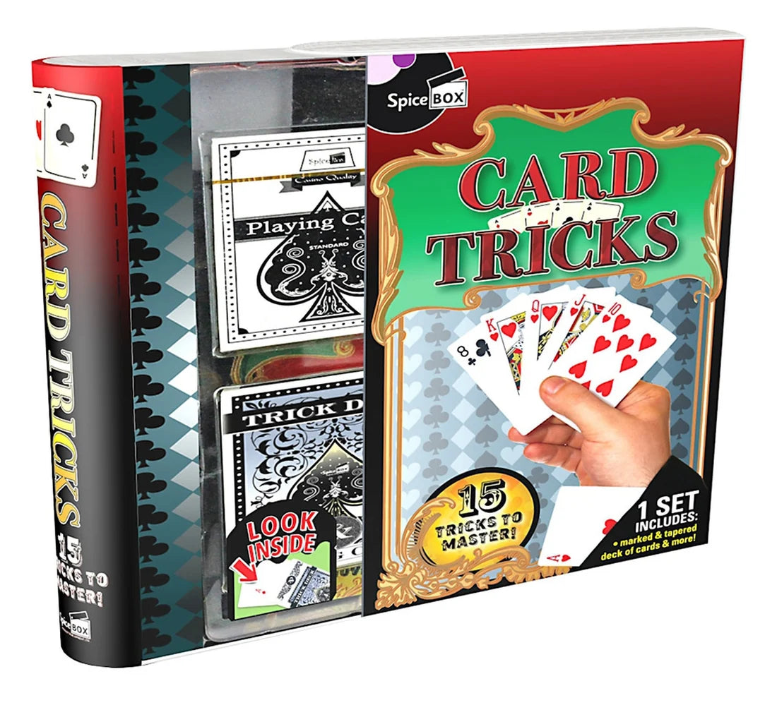 SpiceBox Card Tricks magic trick set in a red and black box with a clear window showing two trick decks and playing cards, plus a hand holding fanned cards on the front cover.