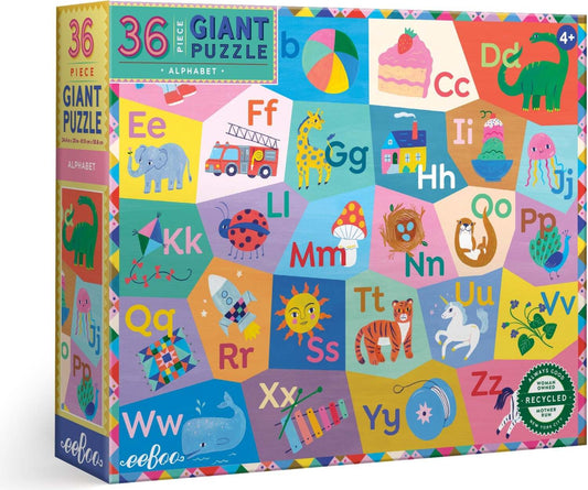 A box of a 36 piece giant alphabet puzzle featuring colorful illustrations of letters and corresponding images like a bee for 'B' and a sun for 'S'. The puzzle is designed by Sarah Walsh and is award-winning, sustainability sourced, and made with recycled board.