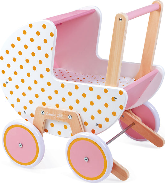 A pink doll's pram with gold dots and white accents, featuring wooden handles and silent rubber wheels, designed for young children to play with their dolls.