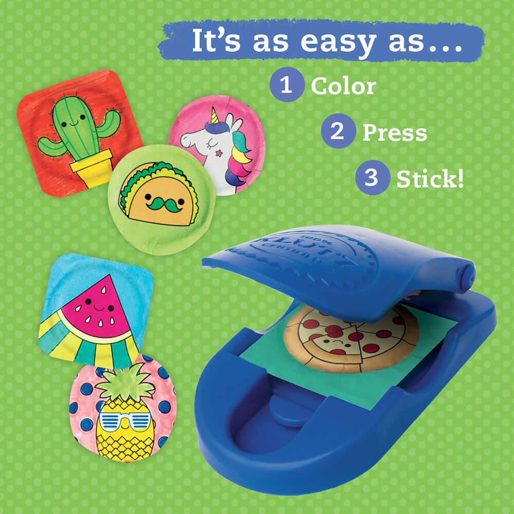Steps: Displays a three-step process: 1 Color, 2 Press, and 3 Stick!
Press Tool: A blue plastic hand-press tool open on the right, holding a pizza sticker design.
Finished Stickers: Five colorful puffy stickers on the left, including a potted cactus, taco, unicorn head, watermelon slice, and pineapple with sunglasses