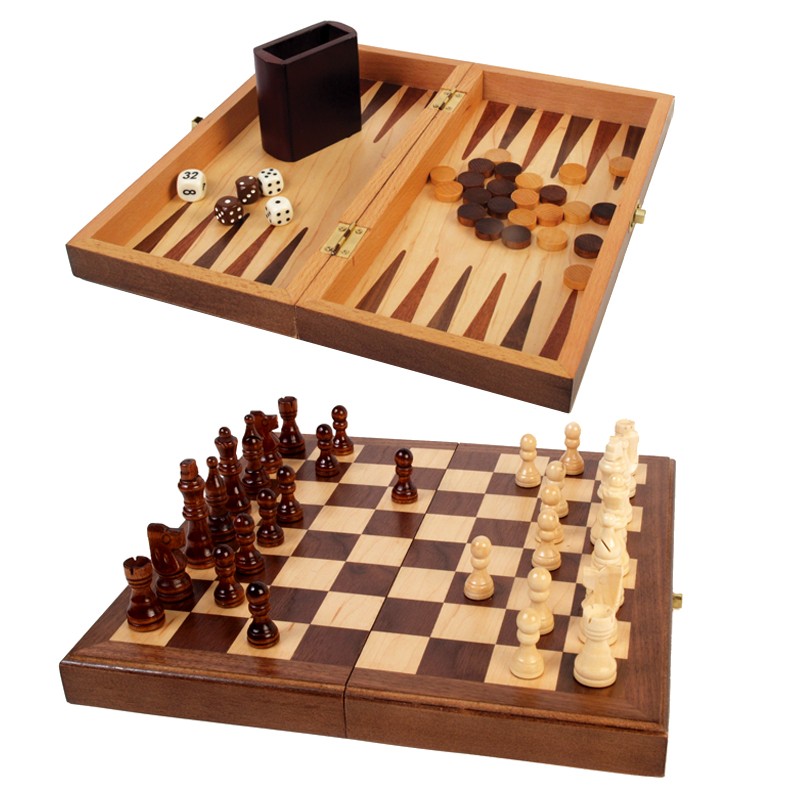 The product image shows a wooden, folding 3-in-1 game board set against a white background:

Top: The open interior displays the backgammon board, playing checkers, dice, and a cup.

Bottom: The closed exterior forms a checkered chess board fully set up with wooden pieces.