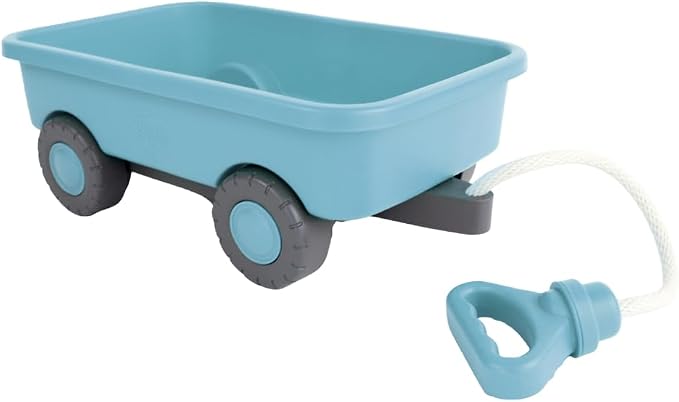Blue toy wagon with a pull handle on a white background