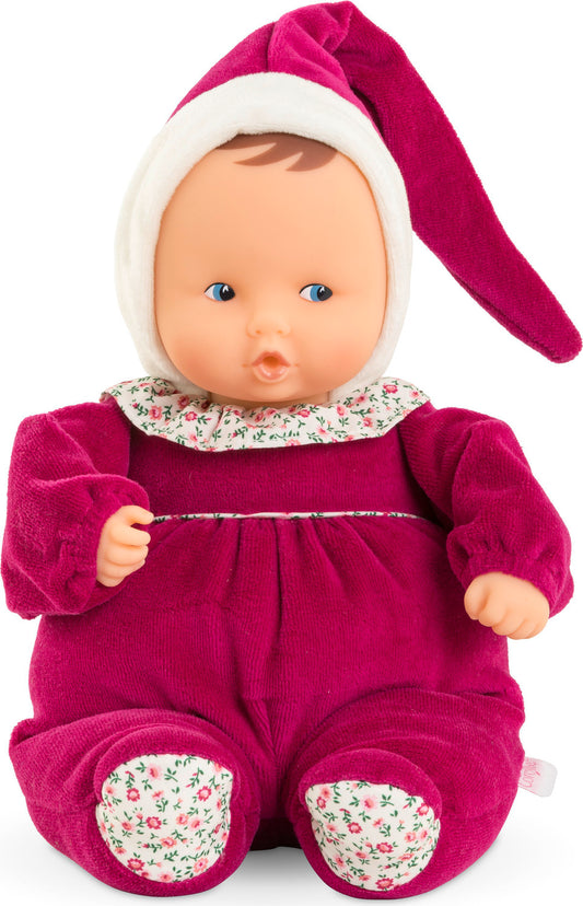 Soft body doll with deep pink pajamas. 