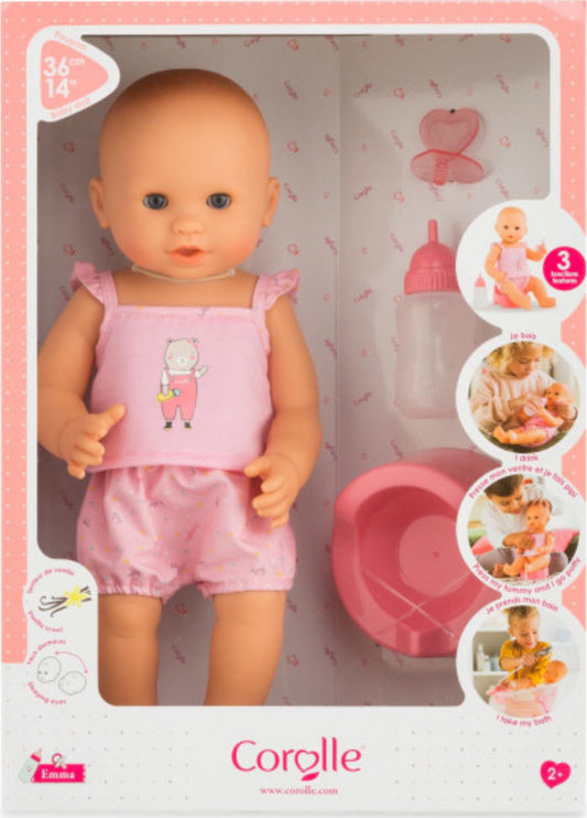 Emma Drink-And-Wet Bath Baby - Corolle
14 inch vinyl baby doll wearing pink tank top and matching shorts.  Set includes Pink potty, pretend play bottle and pink pacifier. 