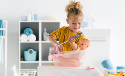 Emma Drink-And-Wet Bath Baby - Corolle  
Doll in bathtub