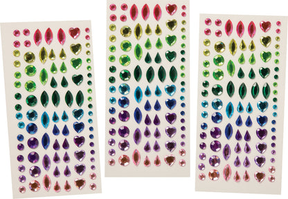 Three sheets of colorful gemstone stickers on a white background