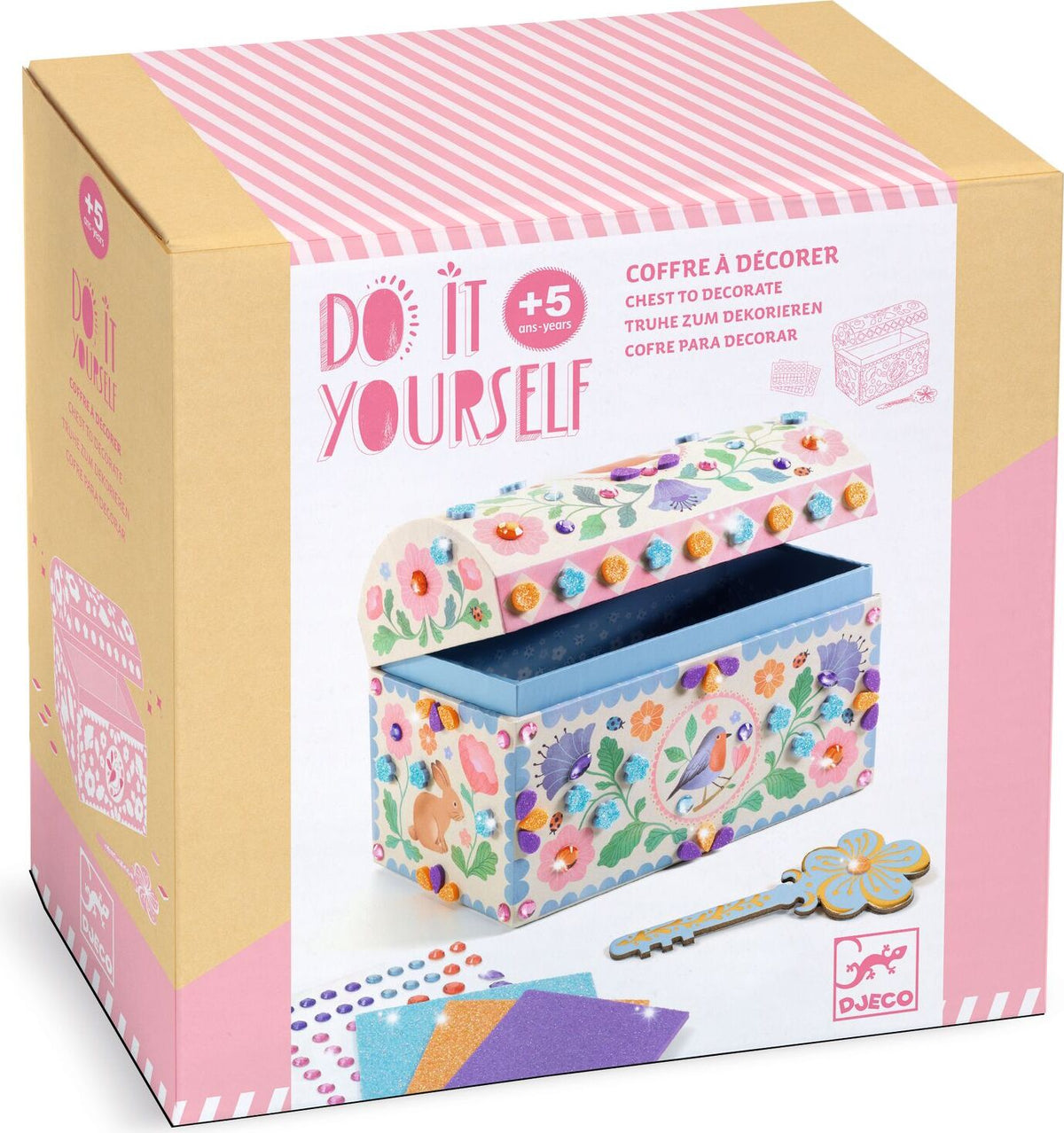 Boxed craft kit labeled 'Do It Yourself' with a decorative chest to decorate. The packaging is tan and pink with a large photo of a pastel floral chest, plus included accessories pictured on the front.