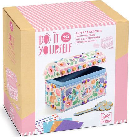 Boxed craft kit labeled 'Do It Yourself' with a decorative chest to decorate. The packaging is tan and pink with a large photo of a pastel floral chest, plus included accessories pictured on the front.