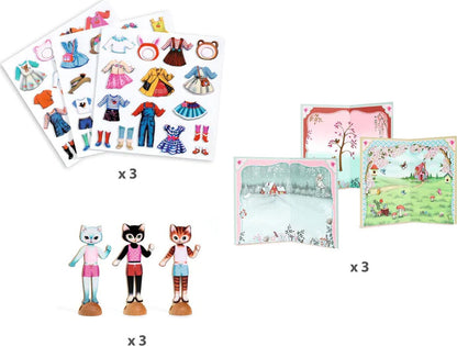 Set of toy figures with clothing cards and scenic backdrops on a white background