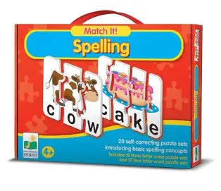 Match It! Spelling puzzle set in a red and blue box with sample puzzle cards showing cow, cake, and other words, photographed on a plain white background.