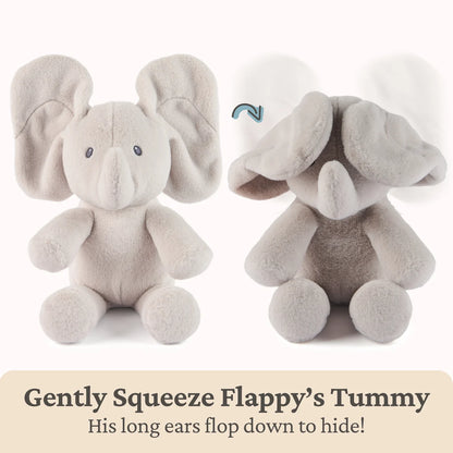 A plush elephant toy shown from the front and back on a white background, with text at the bottom reading 'Gently Squeeze Flappy's Tummy' and 'His long ears flop down to hide!'.