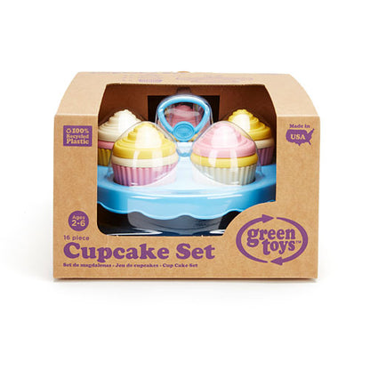 A Green Toys Cupcake Set product packaging, displaying a 16 piece mix-and-match set of cupcakes with frosting and a cake stand.