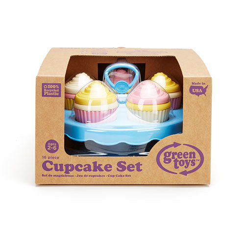 A Green Toys Cupcake Set product packaging, displaying a 16 piece mix-and-match set of cupcakes with frosting and a cake stand.
