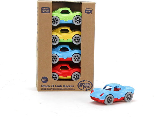 Set of colorful toy cars in a cardboard box with 'Green Toys' branding.