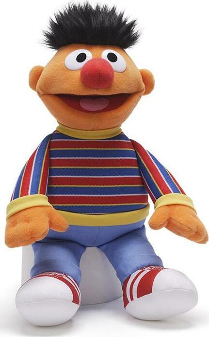 A plush toy resembling a cartoon character with a happy expression, wearing a striped shirt in red, blue, and yellow colors, and blue pants with white shoes.