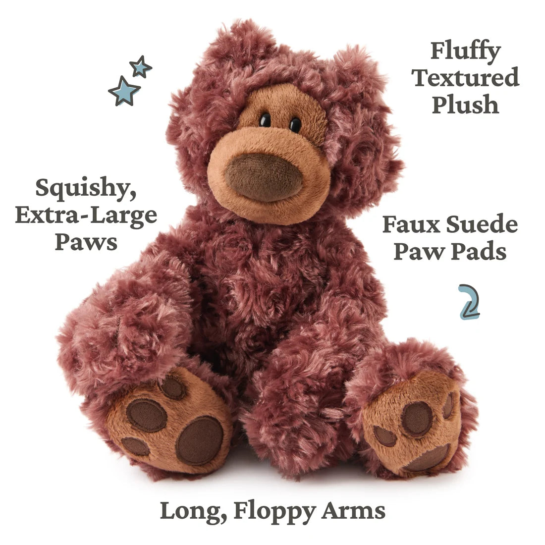 A plush, shaggy teddy bear with deep plum-purple fur sits facing forward on a white background. Surrounding the bear is text pointing out its key features: "Fluffy Textured Plush," "Squishy, Extra-Large Paws," "Faux Suede Paw Pads," and "Long, Floppy Arms."