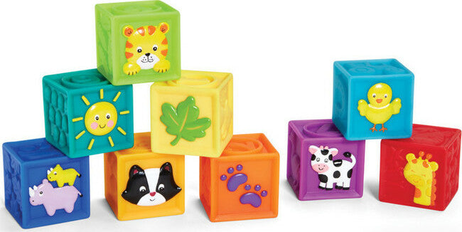 These squeaky blocks feature vibrant colors and detailed imagery, presented against a clean white background.
