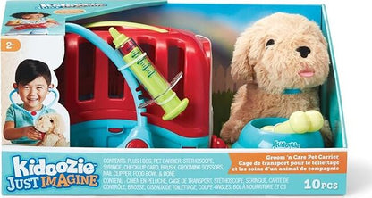 A packaged toy set including a plush puppy and a pet carrier with grooming accessories like a syringe, bandage, and brush. The toy set is designed for children with an emphasis on pretend play as pet owners or veterinarians.