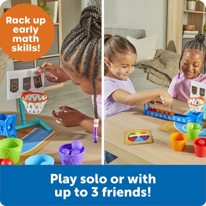Children playing with a math game set in a living room.