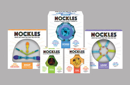 Multiple boxes of Nockles toys on a gray background
