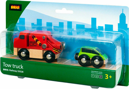 A packaged BRIO Tow Truck toy set featuring a red tow truck and green car, with the BRIO logo and age recommendation visible.