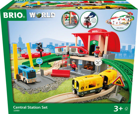 BRIO Central Station Set including a two-level central station, metro train, travel train, bus, railway crossing, tracks and accessories, displayed in packaging.