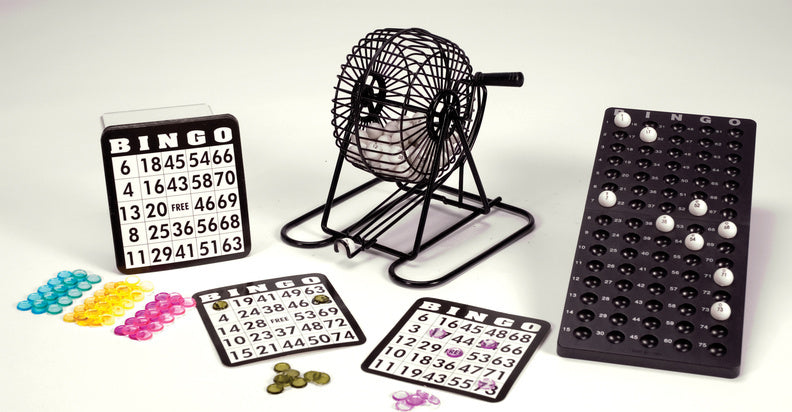 Bingo game components including cards, balls, and a holder on a white background