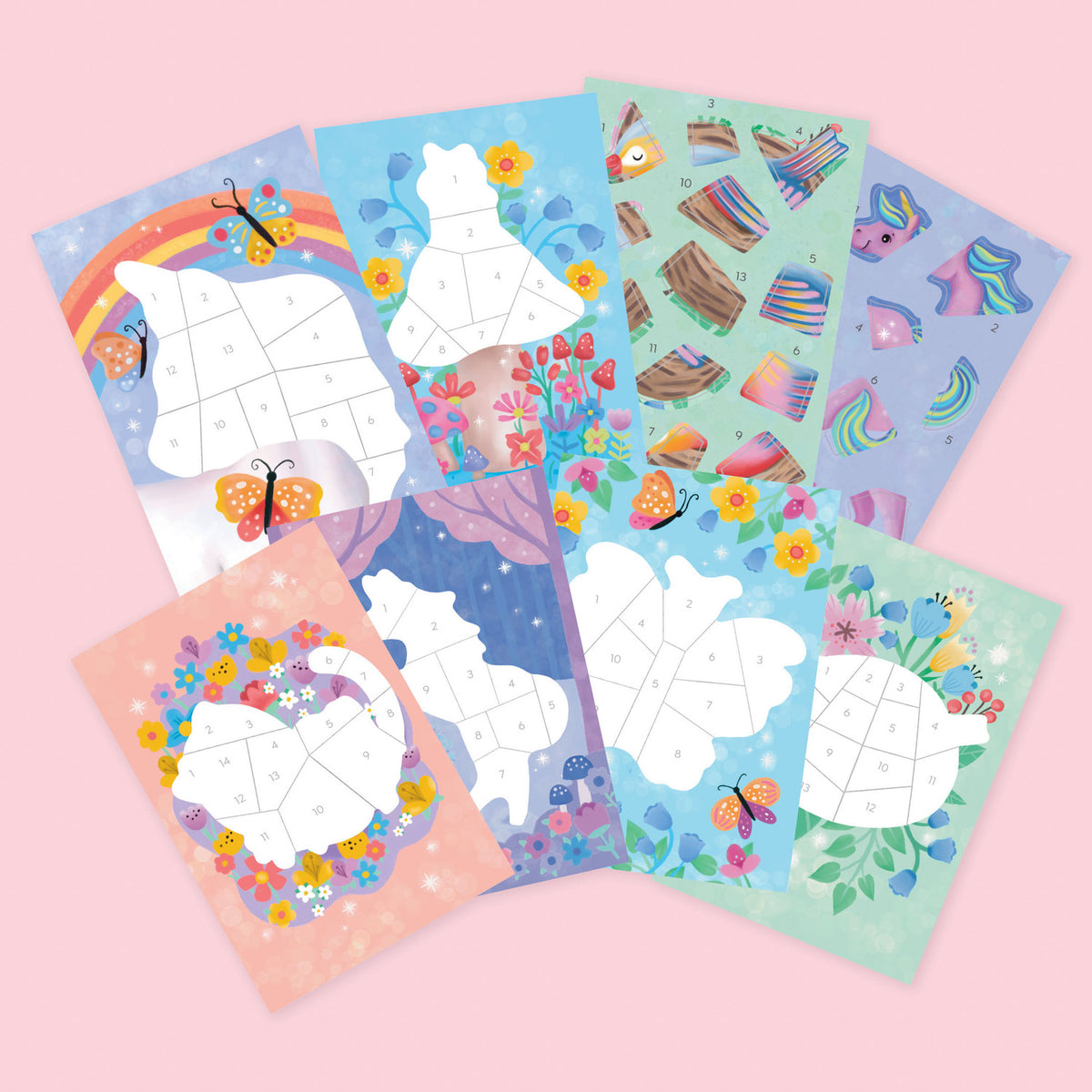 Set of children's activity sheets with animal designs on a pink background