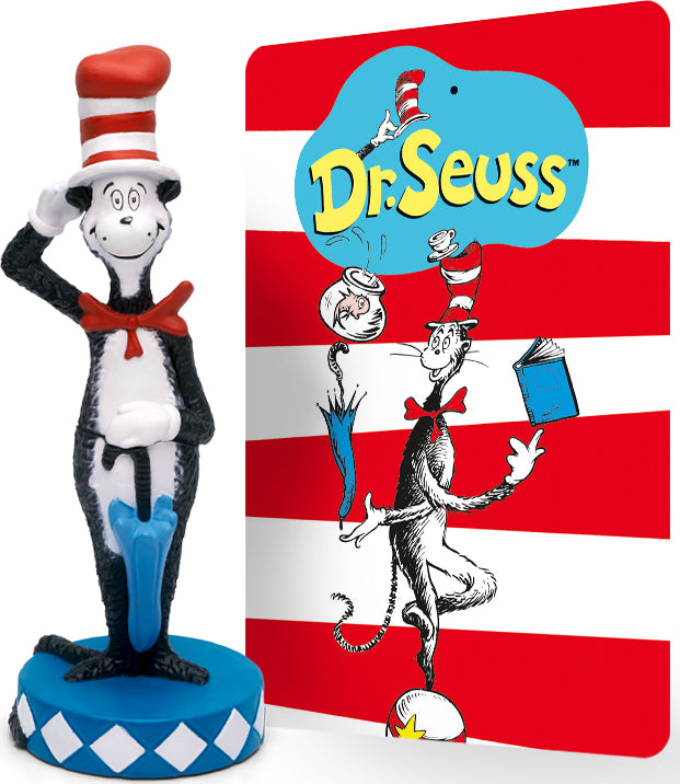 Cat in the hat standing on a blue diamond-patterned base, displayed next to a red and white striped backdrop featuring the DR. Seuss logo and a cartoon illustration of the character balancing various items.