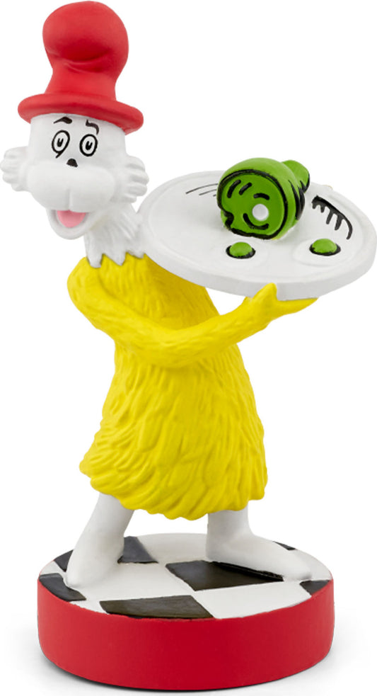 Cartoon character figurine with a yellow dress and red hat on a white background