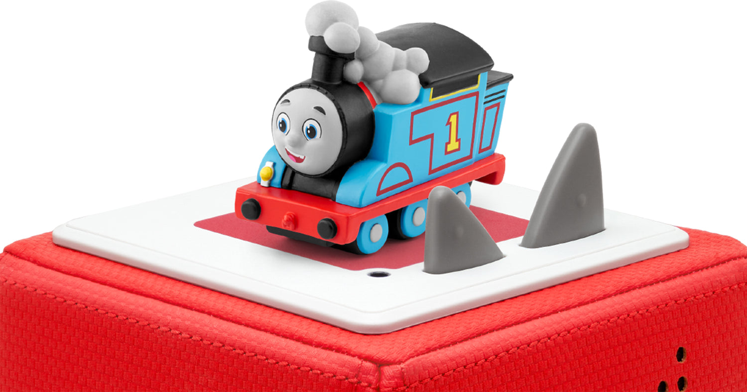 Thomas the Train Tonie, a figurine of Thomas the Tank Engine with a cartridge on top of a red toniebox