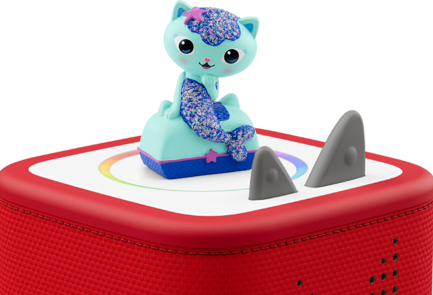 Gabby's dollhouse, mercat figure green and purple color on a red toniebox.