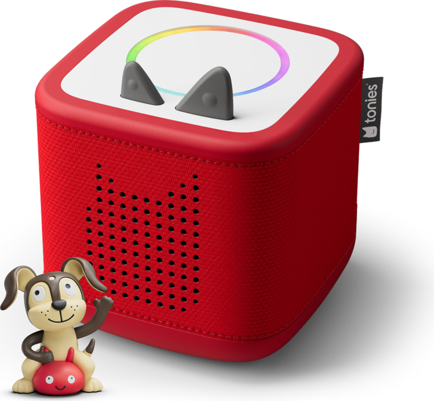 Red toy speaker with a small dog figurine on a white background